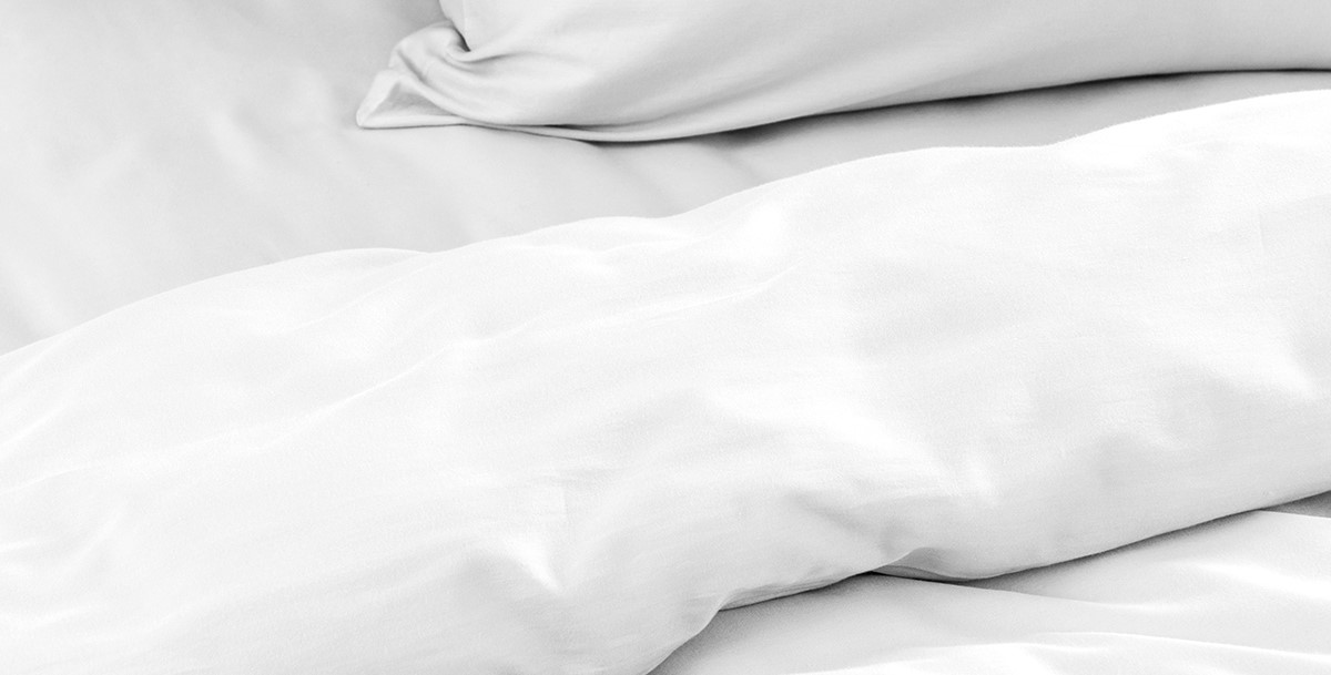 Почему в отелях белое постельное белье, а не цветное: 5 причин